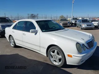 2002 Mercedes-Benz E-Class with VIN WDBJF82J62X076581, listed as a IAAI auction lot 41194976 with 235,453 mi miles. Bid and sale history available at carsss.com. Image 13.