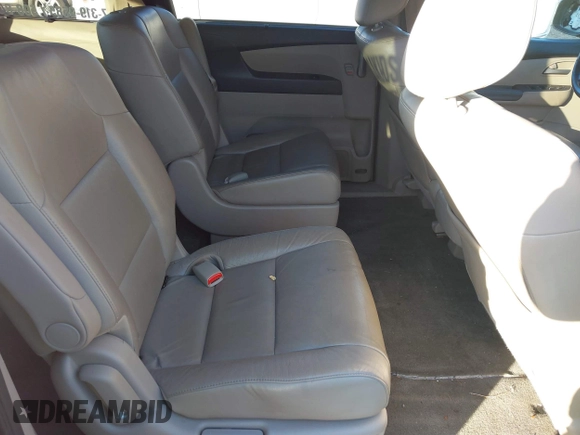 2012 Honda Odyssey Touring with VIN 5FNRL5H9XCB067841, listed as a IAAI auction lot 40631672 with 210,237 mi miles and . Bid and sale history available at DreamBid. Image 8.