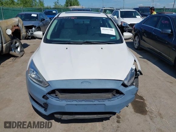 2018 Ford Focus Titanium with VIN 1FADP3N24JL279449, listed as a IAAI auction lot 42297780 with 144,479 mi miles and . Bid and sale history available at DreamBid. Image 12.