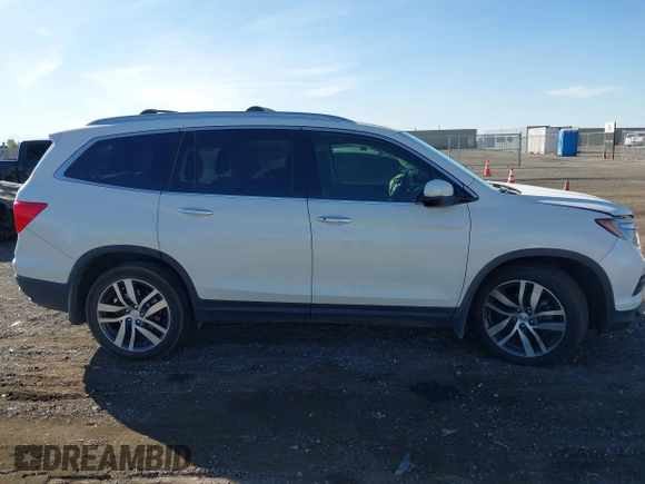 2017 Honda Pilot Elite with VIN 5FNYF6H02HB042160, listed as a IAAI auction lot 40893685 with Not Provided miles and . Bid and sale history available at DreamBid. Image 12.