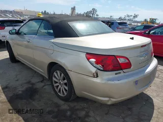 2010 Chrysler Sebring Touring with VIN 1C3BC5ED7AN142671, listed as a IAAI auction lot 42021533 with 115,098 mi miles and . Bid and sale history available at DreamBid. Image 3.