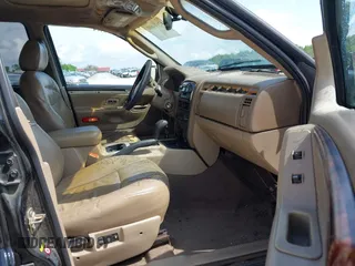 2002 Jeep Grand Cherokee Limited with VIN 1J8GX58N32C130002, listed as a IAAI auction lot 42179840 with 246,661 mi miles and . Bid and sale history available at DreamBid. Image 5.