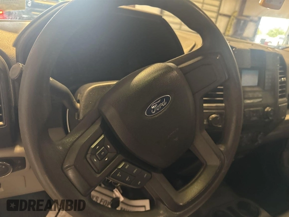 2017 Ford F-150 XL with VIN 1FTEX1E84HKE25601, listed as a IAAI auction lot 42737670 with 215,196 mi miles and . Bid and sale history available at DreamBid. Image 19.