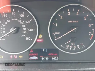 2013 BMW 3 Series 328i with VIN WBA3C1G57DNR49126, listed as a IAAI auction lot 41334342 with 164,710 mi miles and . Bid and sale history available at DreamBid. Image 15.