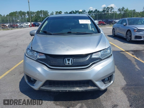 2015 Honda Fit EX-L z VIN 3HGGK5H82FM727678, wystawiony jako IAAI lot #42451860 z przebiegiem 102 512 mil mil oraz . Historia ofert i sprzedaży dostępna na DreamBid. Obrazek 12.