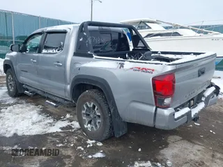 2019 Toyota Tacoma SR z VIN 3TMCZ5AN8KM211246, wystawiony jako IAAI lot #41574346 z przebiegiem 66 825 mil mil oraz . Historia ofert i sprzedaży dostępna na DreamBid. Obrazek 3.