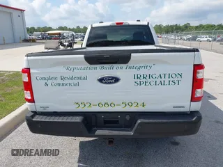 2023 Ford F-150 XL with VIN 1FTMF1CP7PKF84555, listed as a IAAI auction lot 42197597 with 12,216 mi miles and . Bid and sale history available at DreamBid. Image 17.