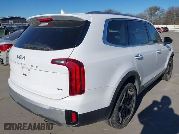 2023 Kia Telluride S with VIN 5XYP6DGC0PG402531, listed as a IAAI auction lot 41377916 with 32,717 mi miles and . Bid and sale history available at DreamBid. Image 4.