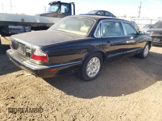 2001 Jaguar XJ with VIN SAJDA23C31LF28667, listed as a Copart auction lot 76983144 with 87,542 mi miles and Clean title. Bid and sale history available at DreamBid. Image 3.