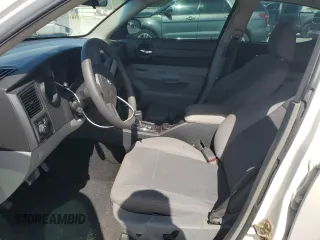 2006 Dodge Charger z VIN 2B3KA43G06H502230, wystawiony jako Copart lot #57057535 z przebiegiem 135 230 mil mil oraz Szkoda całkowita • Salvage title. Historia ofert i sprzedaży dostępna na DreamBid. Obrazek 7.