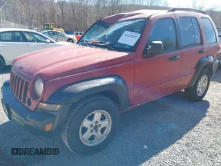 2005 Jeep Liberty Sport with VIN 1J4GL48K35W645419, listed as a IAAI auction lot 41823845 with 168,896 mi miles. Bid and sale history available at carsss.com. Image 2.