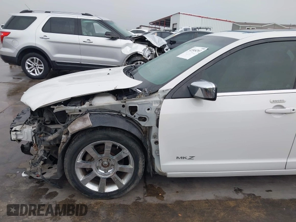2008 Lincoln MKZ z VIN 3LNHM26TX8R625632, wystawiony jako IAAI lot #41905293 z przebiegiem 205 485 mil mil oraz . Historia ofert i sprzedaży dostępna na DreamBid. Obrazek 19.