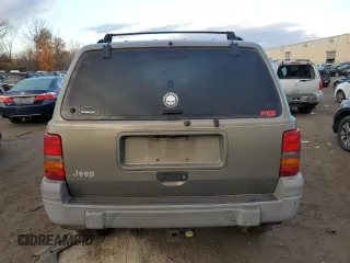 1997 Jeep Grand Cherokee Laredo with VIN 1J4GZ58S1VC741586, listed as a Copart auction lot 77619394 with 0 mi miles and Clean Title. Bid and sale history available at carsss.com. Image 6.