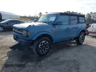 2022 Ford Bronco z VIN 1FMDE5DH0NLB77892, wystawiony jako IAAI lot #41466172 z przebiegiem 38 709 mil mil oraz . Historia ofert i sprzedaży dostępna na DreamBid. Obrazek 17.