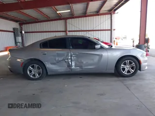 2015 Dodge Charger SE with VIN 2C3CDXBG1FH840060, listed as a IAAI auction lot 42111676 with 165,479 mi miles and . Bid and sale history available at carsss.com. Image 13.