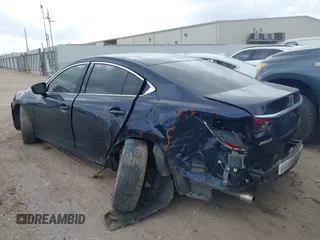 2017 Mazda Mazda6 Touring with VIN JM1GL1V54H1107722, listed as a IAAI auction lot 41521257 with 142,129 mi miles. Bid and sale history available at carsss.com. Image 3.