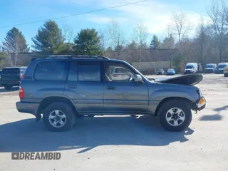 1999 Toyota Land Cruiser with VIN JT3HT05J5X0045784, listed as a IAAI auction lot 41886919 with 505,121 mi miles. Bid and sale history available at carsss.com. Image 14.