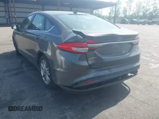 2017 Ford Fusion SE z VIN 3FA6P0H76HR259097, wystawiony jako IAAI lot #42133090 z przebiegiem 187 400 mil mil oraz . Historia ofert i sprzedaży dostępna na DreamBid. Obrazek 6.