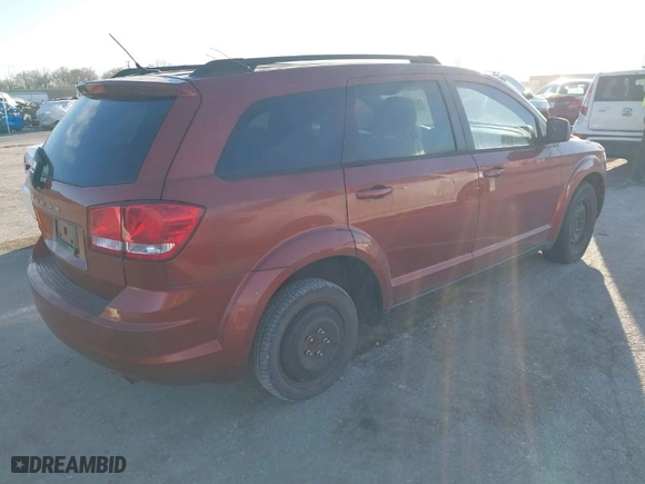 2012 Dodge Journey SE with VIN 3C4PDCAB8CT297188, listed as a IAAI auction lot 41661370 with 157,803 mi miles. Bid and sale history available at carsss.com. Image 4.