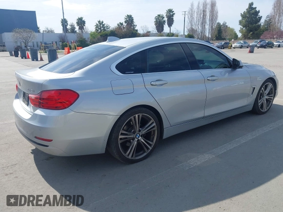 2016 BMW 4 Series 428i with VIN WBA4A9C55GG695469, listed as a IAAI auction lot 41753857 with 90,692 mi miles. Bid and sale history available at carsss.com. Image 4.