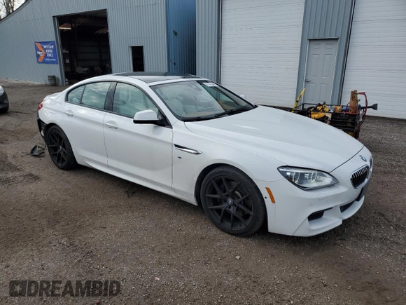 2015 BMW 6 Series 640i xDrive z VIN WBA6B8C56FD453175, wystawiony jako Copart lot #81372044 z przebiegiem 111 835 mil mil oraz Czysty tytuł • Clean title. Historia ofert i sprzedaży dostępna na DreamBid. Obrazek 4.