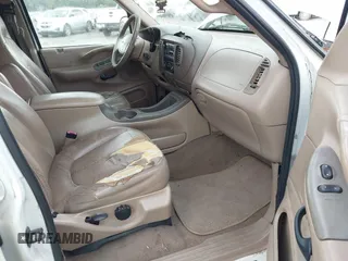 1998 Ford Expedition XLT с VIN 1FMRU1764WLA65495, выставлен на аукционе IAAI как лот 42382563 с пробегом 223 429 миль миль и . История ставок и продаж доступна на DreamBid. Изображение 5.