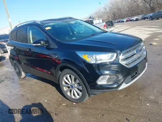 2017 Ford Escape Titanium with VIN 1FMCU0J94HUD58815, listed as a IAAI auction lot 41455415 with 80,421 mi miles and . Bid and sale history available at DreamBid. Image 1.
