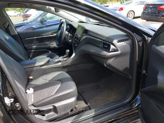 2023 Toyota Camry SE with VIN 4T1G11AK2PU828745, listed as a IAAI auction lot 42193957 with 35,399 mi miles and . Bid and sale history available at carsss.com. Image 5.