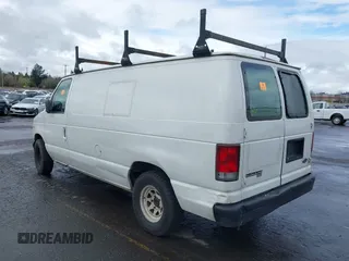1998 Ford Econoline Cargo with VIN 1FTRE146XWHA45793, listed as a IAAI auction lot 41921474 with 168,307 mi miles and . Bid and sale history available at DreamBid. Image 3.