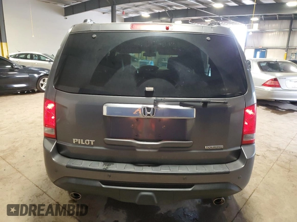 2013 Honda Pilot Touring z VIN 5FNYF3H91DB034638, wystawiony jako Copart lot #59858755 z przebiegiem 115 445 mil mil oraz Szkoda całkowita • Salvage title. Historia ofert i sprzedaży dostępna na DreamBid. Obrazek 6.