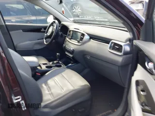 2016 Kia Sorento SX with VIN 5XYPKDA58GG002304, listed as a IAAI auction lot 41990332 with 132,025 mi miles. Bid and sale history available at carsss.com. Image 5.