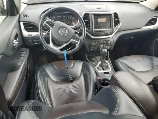 2014 Jeep Cherokee Limited с VIN 1C4PJMDB4EW151474, выставлен на аукционе Copart как лот 56904145 с пробегом 113 269 миль миль и Списание • Salvage title. История ставок и продаж доступна на DreamBid. Изображение 8.