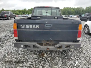 1988 Nissan Hardbody E z VIN 1N6ND16Y4JC384522, wystawiony jako Copart lot #64570204 z przebiegiem 10 784 mil mil oraz Szkody całkowita. Historia ofert i sprzedaży dostępna na DreamBid. Obrazek 6.