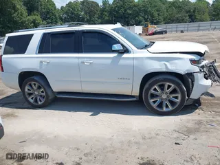 2018 Chevrolet Tahoe Premier with VIN 1GNSCCKCXJR324733, listed as a IAAI auction lot 40102147 with 119,134 mi miles. Bid and sale history available at carsss.com. Image 13.