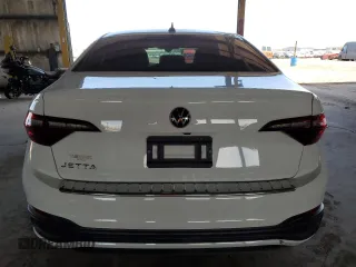 2023 Volkswagen Jetta Sport z VIN 3VWBM7BU1PM004990, wystawiony jako Copart lot #58820535 z przebiegiem 58 070 mil mil oraz Czysty tytuł • Clean title. Historia ofert i sprzedaży dostępna na DreamBid. Obrazek 6.