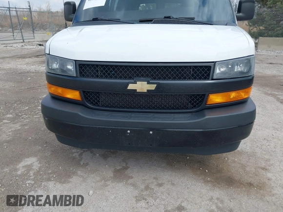 2018 Chevrolet Express Cargo Van with VIN 1GCWGAFP6J1336229, listed as a IAAI auction lot 42022722 with 99,005 mi miles. Bid and sale history available at carsss.com. Image 6.