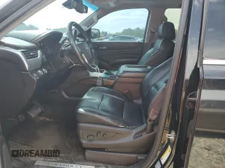 2015 Chevrolet Suburban LT with VIN 1GNSKJKC7FR532678, listed as a Copart auction lot 53715265 with 190,927 mi miles and Salvage Title. Bid and sale history available at DreamBid. Image 7.