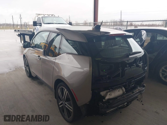 2014 BMW i3 with VIN WBY1Z4C57EV276127, listed as a IAAI auction lot 41531408 with 105,696 mi miles and . Bid and sale history available at DreamBid. Image 6.