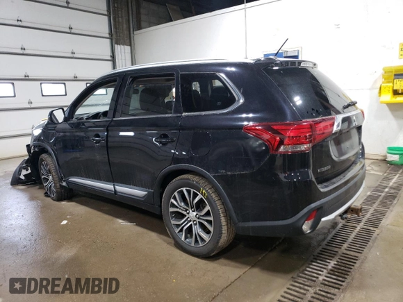 2016 Mitsubishi Outlander GT with VIN JA4JZ4AX7GZ011316, listed as a Copart auction lot 58734695 with 188,955 mi miles and Salvage title. Bid and sale history available at DreamBid. Image 2.