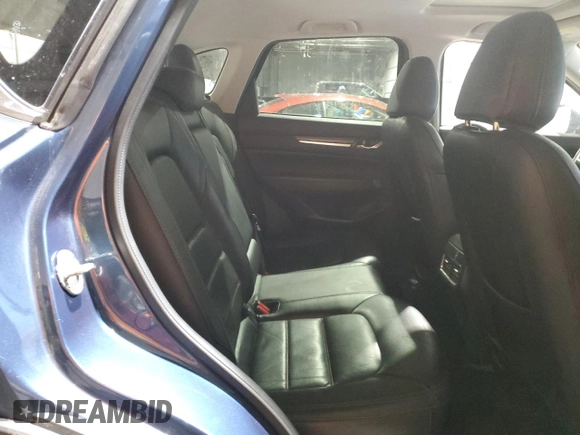 2018 Mazda CX-5 Grand Touring with VIN JM3KFBDM1J0304706, listed as a Copart auction lot 46123415 with 104,004 mi miles and Salvage title. Bid and sale history available at DreamBid. Image 11.