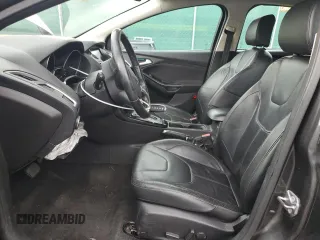 2016 Ford Focus Titanium z VIN 1FADP3N27GL329026, wystawiony jako Copart lot #60910475 z przebiegiem 98 794 mil mil oraz Szkoda całkowita • Salvage title. Historia ofert i sprzedaży dostępna na DreamBid. Obrazek 7.