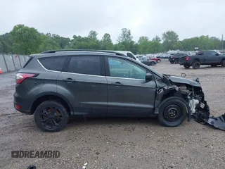 2017 Ford Escape SE z VIN 1FMCU9G95HUC83618, wystawiony jako IAAI lot #42324672 z przebiegiem 132 910 mil mil oraz . Historia ofert i sprzedaży dostępna na DreamBid. Obrazek 13.