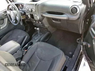 2015 Jeep Wrangler Freedom Edition with VIN 1C4AJWAG8FL541675, listed as a Copart auction lot 62647855 with 53,915 mi miles and Salvage title. Bid and sale history available at DreamBid. Image 8.