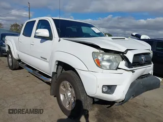 2015 Toyota Tacoma PreRunner with VIN 3TMKU4HN6FM044238, listed as a IAAI auction lot 41534623 with 196,490 mi miles and . Bid and sale history available at DreamBid. Image 1.