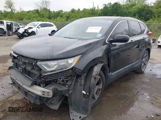 2017 Honda CR-V EX with VIN 7FARW1H59HE007171, listed as a IAAI auction lot 42033941 with 134,227 mi miles and . Bid and sale history available at DreamBid. Image 17.