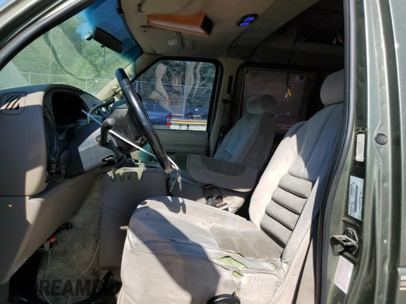 2002 Ford Econoline Cargo with VIN 1FDRE14W62HB15506, listed as a Copart auction lot 74686494 with 253,296 mi miles and Salvage Title. Bid and sale history available at DreamBid. Image 7.