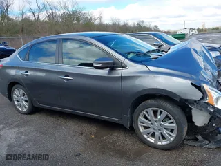 2015 Nissan Sentra S with VIN 3N1AB7APXFY216474, listed as a IAAI auction lot 41293511 with 73,767 mi miles. Bid and sale history available at carsss.com. Image 13.