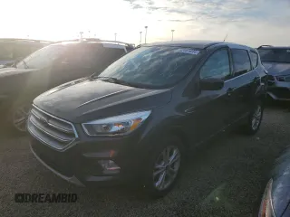 2017 Ford Escape SE z VIN 1FMCU0GDXHUE91333, wystawiony jako Copart lot #82061644 z przebiegiem Nie podano mil oraz Nie do naprawy • Non repairable. Historia ofert i sprzedaży dostępna na DreamBid. Obrazek 1.