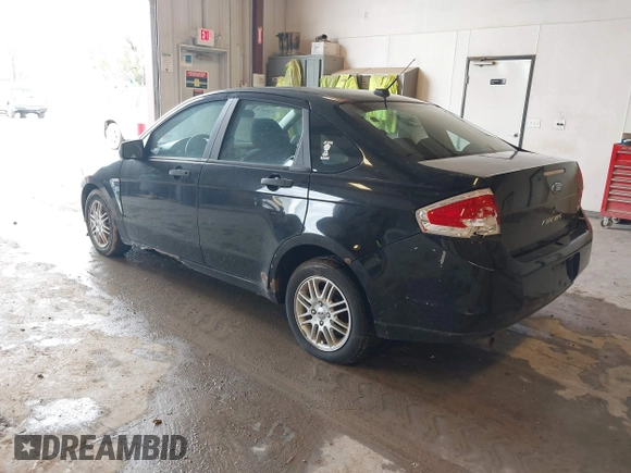 2009 Ford Focus SE with VIN 1FAHP35N69W128084, listed as a IAAI auction lot 42202678 with 290,358 mi miles. Bid and sale history available at carsss.com. Image 3.