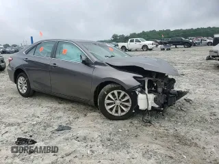 2015 Toyota Camry XLE z VIN 4T4BF1FK6FR516551, wystawiony jako Copart lot #58036375 z przebiegiem 160 631 mil mil oraz Szkoda całkowita • Salvage title. Historia ofert i sprzedaży dostępna na DreamBid. Obrazek 13.